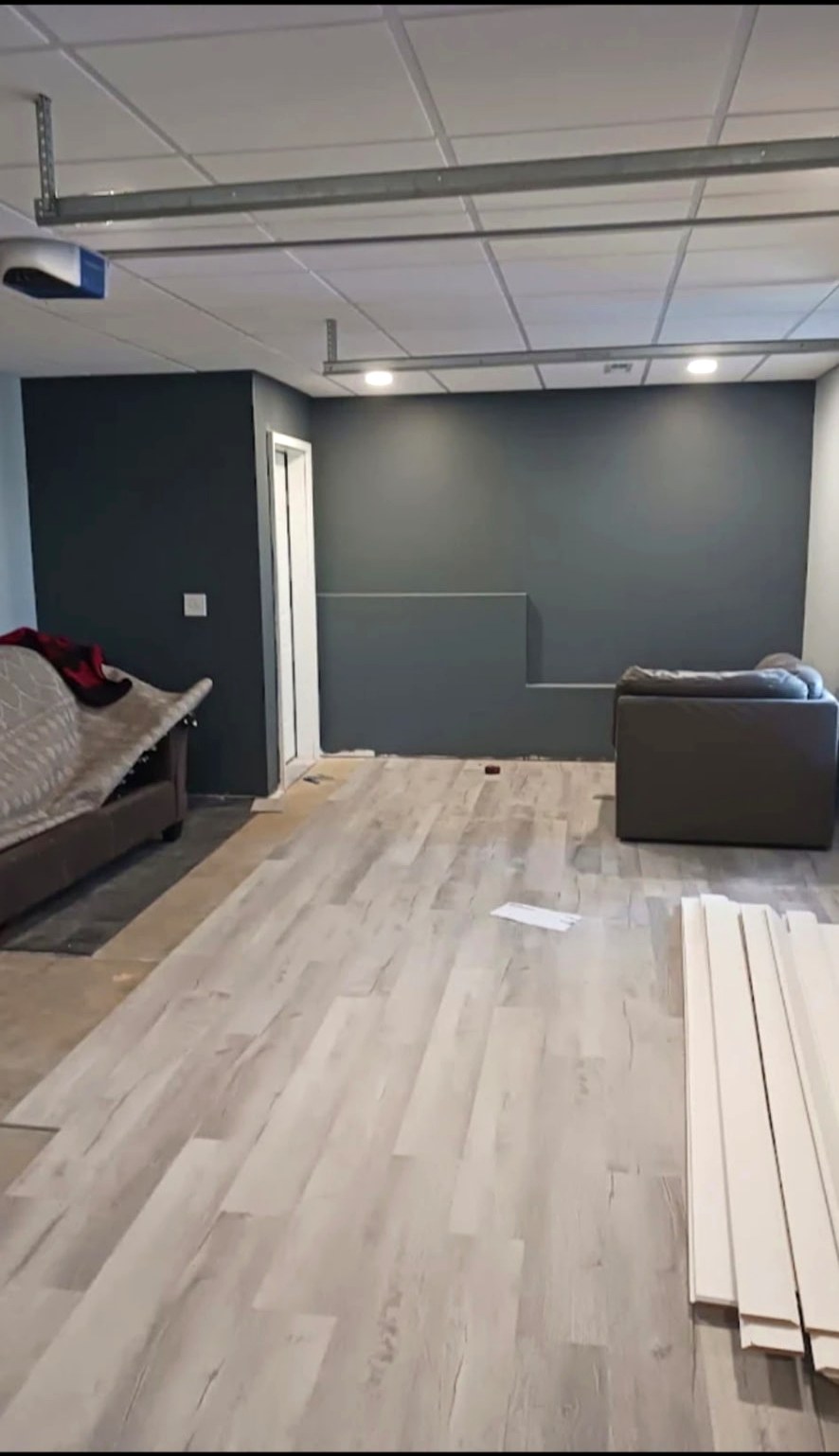 Garage conversion — laminate flooring & paint