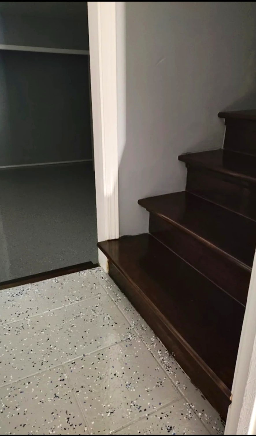 Stair refinish with tile landing
